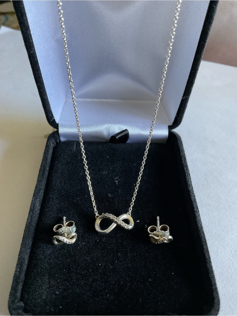Pandora Sterling Silver infinity Necklace and earrings set.